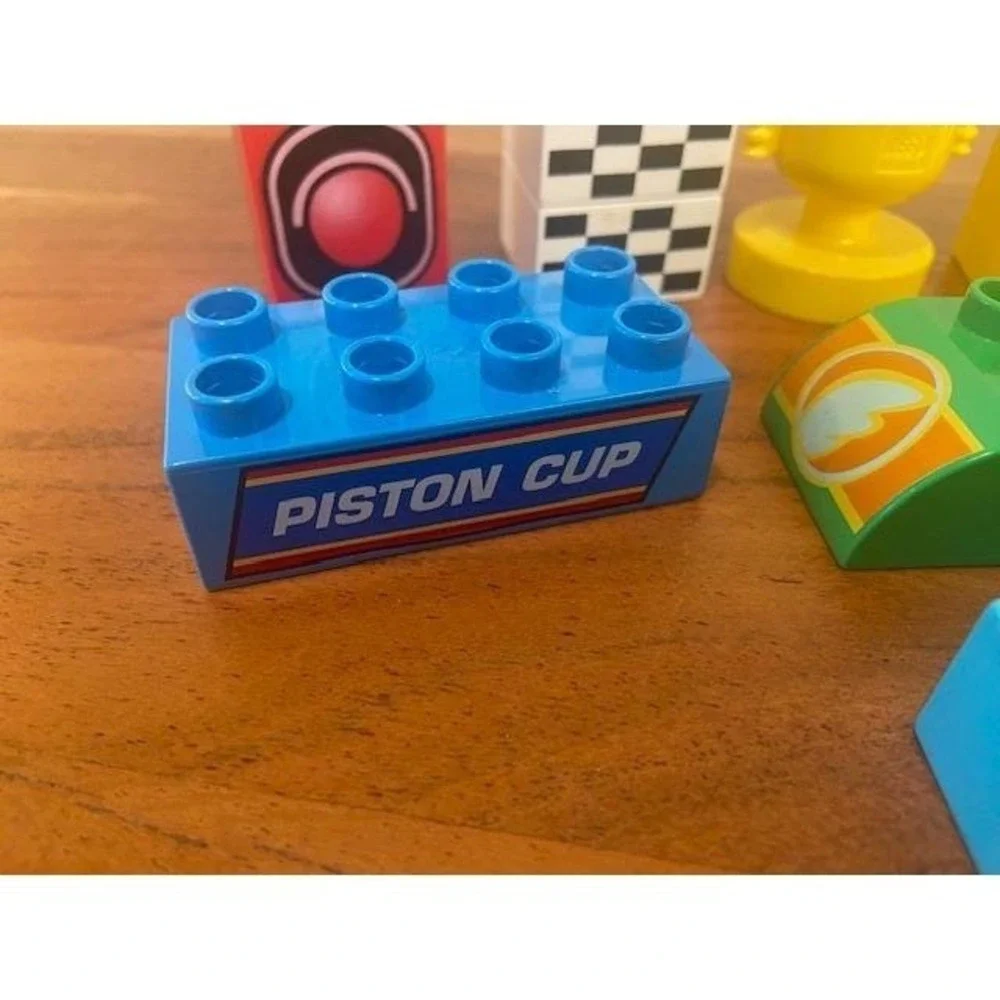 LEGO Duplo Specialty Pieces Lot of 50 Zoo Tiger Piston Cup Octan Racing Trophy